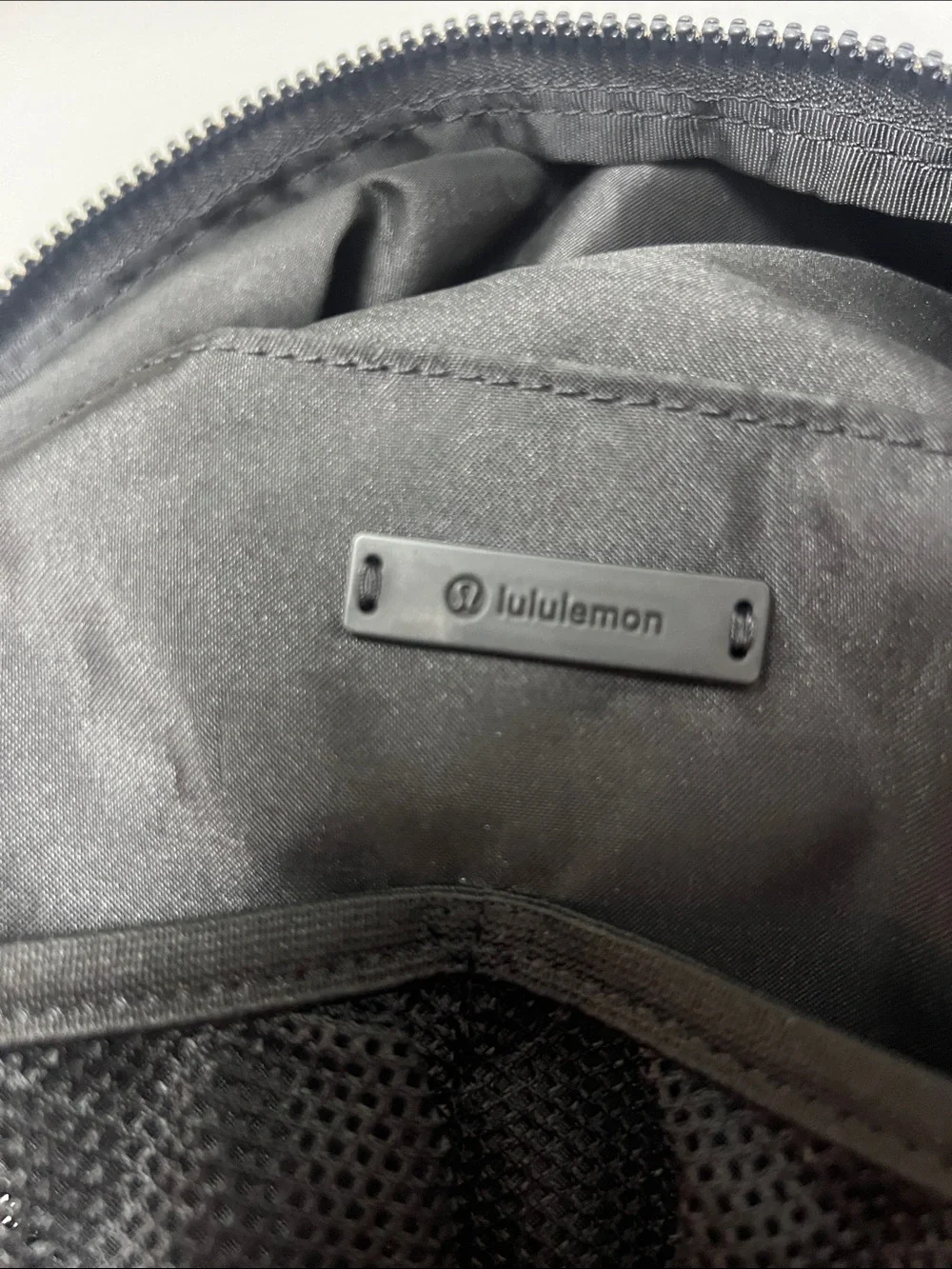 lululemon athletica black backpack with front zip pouch